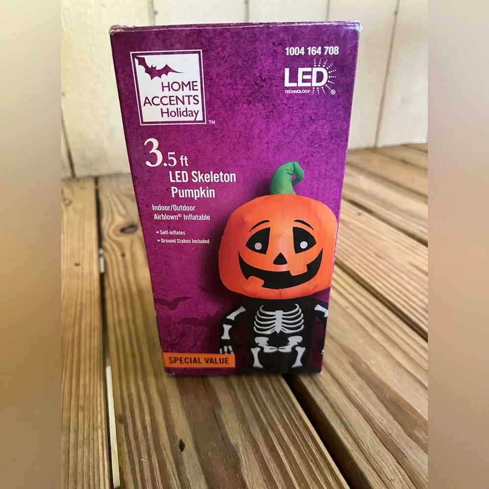 Home Accents Holiday 3.5 ft. Pre-lit Inflatable Happy Pumpkin Boy Skeleton LED